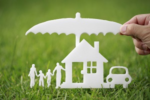 paper house and car covered by paper umbrella